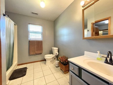 Incredible home nestled in the lake Ridge Subdivision and golf on Lake Perry Country Club in Kansas - for sale on GolfHomes.com, golf home, golf lot