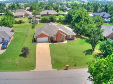 Charming 4 Bedroom , 3 Bath home in Oaktree Estates is situated on Oak Tree National Golf and Country Club in Oklahoma - for sale on GolfHomes.com, golf home, golf lot
