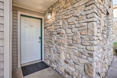 Freshly updated ground floor condo overlooking the water on Holiday Hills Resort and Golf in Missouri - for sale on GolfHomes.com, golf home, golf lot