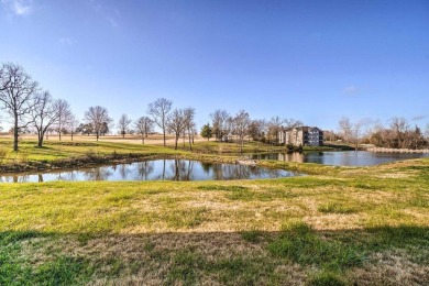 Freshly updated ground floor condo overlooking the water on Holiday Hills Resort and Golf in Missouri - for sale on GolfHomes.com, golf home, golf lot