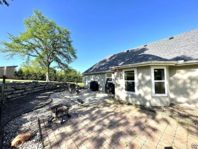 Incredible home nestled in the lake Ridge Subdivision and golf on Lake Perry Country Club in Kansas - for sale on GolfHomes.com, golf home, golf lot