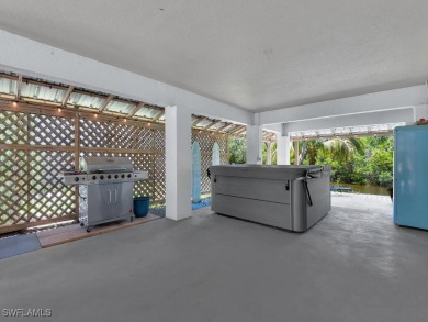 Private Waterfront Retreat on Alligator Creek - Oversized Double on Twin Isles Country Club in Florida - for sale on GolfHomes.com, golf home, golf lot