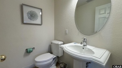 Nestled on a peaceful cul-de-sac in the prestigious Currituck on The Currituck Golf Club in North Carolina - for sale on GolfHomes.com, golf home, golf lot