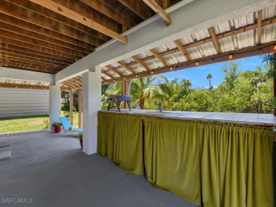 Private Waterfront Retreat on Alligator Creek - Oversized Double on Twin Isles Country Club in Florida - for sale on GolfHomes.com, golf home, golf lot