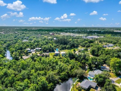 Private Waterfront Retreat on Alligator Creek - Oversized Double on Twin Isles Country Club in Florida - for sale on GolfHomes.com, golf home, golf lot