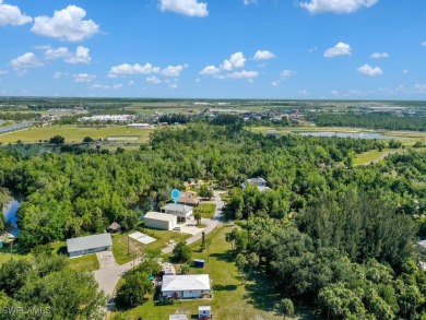 Private Waterfront Retreat on Alligator Creek - Oversized Double on Twin Isles Country Club in Florida - for sale on GolfHomes.com, golf home, golf lot