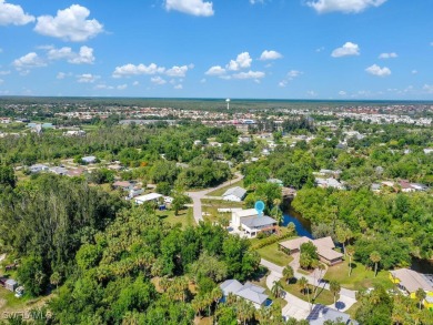 Private Waterfront Retreat on Alligator Creek - Oversized Double on Twin Isles Country Club in Florida - for sale on GolfHomes.com, golf home, golf lot