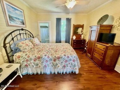 This lovingly renovated craftsman type cottage built in 1919 is on The Bridges Golf Club At Hollywood Casino in Mississippi - for sale on GolfHomes.com, golf home, golf lot