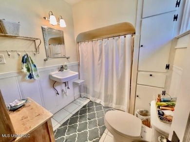 This lovingly renovated craftsman type cottage built in 1919 is on The Bridges Golf Club At Hollywood Casino in Mississippi - for sale on GolfHomes.com, golf home, golf lot