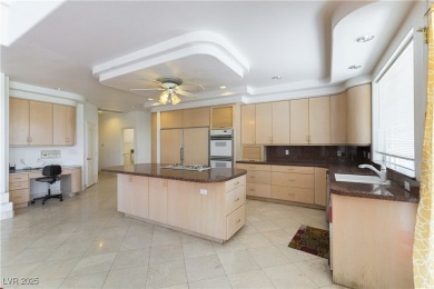 Located in the prestigious guard-gated Grand Legacy golf course on The Legacy Golf Club in Nevada - for sale on GolfHomes.com, golf home, golf lot