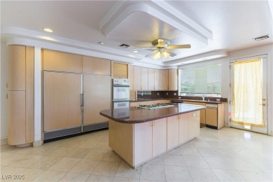 Located in the prestigious guard-gated Grand Legacy golf course on The Legacy Golf Club in Nevada - for sale on GolfHomes.com, golf home, golf lot