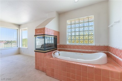Located in the prestigious guard-gated Grand Legacy golf course on The Legacy Golf Club in Nevada - for sale on GolfHomes.com, golf home, golf lot
