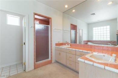 Located in the prestigious guard-gated Grand Legacy golf course on The Legacy Golf Club in Nevada - for sale on GolfHomes.com, golf home, golf lot