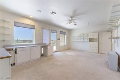 Located in the prestigious guard-gated Grand Legacy golf course on The Legacy Golf Club in Nevada - for sale on GolfHomes.com, golf home, golf lot