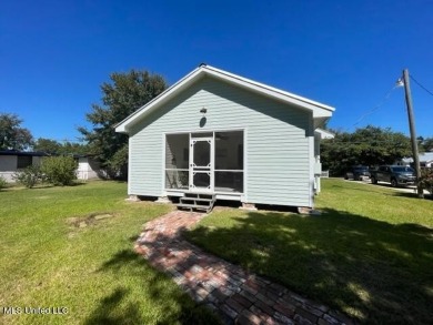 This lovingly renovated craftsman type cottage built in 1919 is on The Bridges Golf Club At Hollywood Casino in Mississippi - for sale on GolfHomes.com, golf home, golf lot