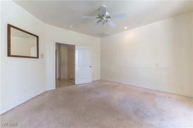 Located in the prestigious guard-gated Grand Legacy golf course on The Legacy Golf Club in Nevada - for sale on GolfHomes.com, golf home, golf lot