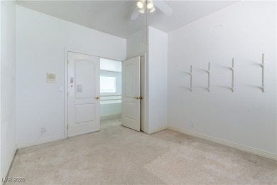 Located in the prestigious guard-gated Grand Legacy golf course on The Legacy Golf Club in Nevada - for sale on GolfHomes.com, golf home, golf lot