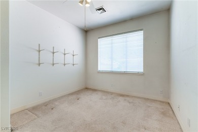 Located in the prestigious guard-gated Grand Legacy golf course on The Legacy Golf Club in Nevada - for sale on GolfHomes.com, golf home, golf lot