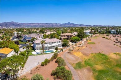 Located in the prestigious guard-gated Grand Legacy golf course on The Legacy Golf Club in Nevada - for sale on GolfHomes.com, golf home, golf lot