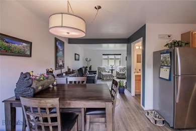 Welcome home to this low maintenance townhouse in Meadowlark on Butte Country Club in Montana - for sale on GolfHomes.com, golf home, golf lot