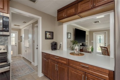 Live the Dunedin dream from this beautifully renovated on The Dunedin Country Club in Florida - for sale on GolfHomes.com, golf home, golf lot