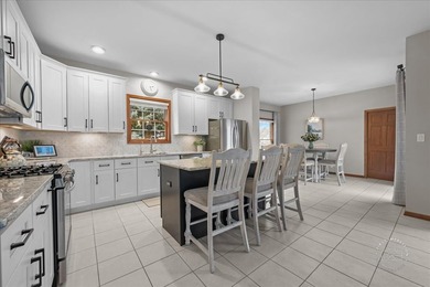 Located in coveted Mill Creek of Geneva, this beautifully on Mill Creek Golf Club in Illinois - for sale on GolfHomes.com, golf home, golf lot