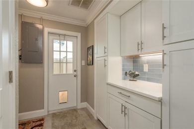 Live the Dunedin dream from this beautifully renovated on The Dunedin Country Club in Florida - for sale on GolfHomes.com, golf home, golf lot