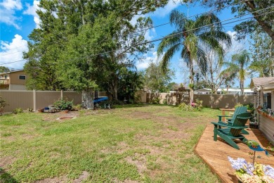 Live the Dunedin dream from this beautifully renovated on The Dunedin Country Club in Florida - for sale on GolfHomes.com, golf home, golf lot
