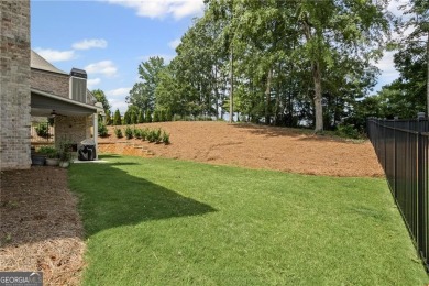 Welcome to this beautiful 5-bedroom, 4-bathroom home located in on Traditions of Braselton Golf Club in Georgia - for sale on GolfHomes.com, golf home, golf lot
