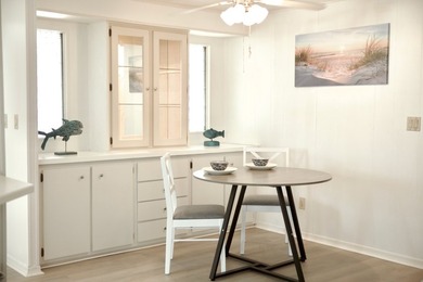 This lovely, 2/2 manufactured home on leased land in Lake on Pine Lakes Country Club in Florida - for sale on GolfHomes.com, golf home, golf lot