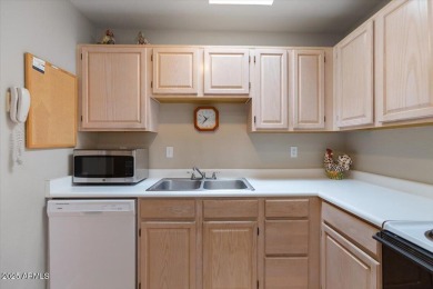 Enjoy all this furnished Sun Village condominium and Golf Resort on Sun Village Golf Course in Arizona - for sale on GolfHomes.com, golf home, golf lot