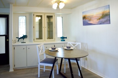 This lovely, 2/2 manufactured home on leased land in Lake on Pine Lakes Country Club in Florida - for sale on GolfHomes.com, golf home, golf lot