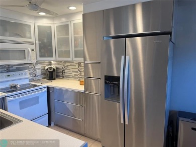 FANTASTIC REMODELED 2 BEDROOMS GROUND FLOOR, Stainless steel on Hillsboro Pines Golf in Florida - for sale on GolfHomes.com, golf home, golf lot