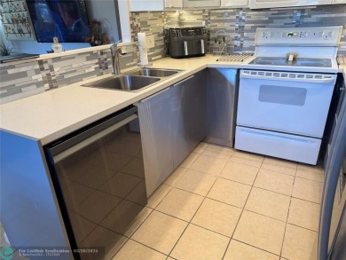 FANTASTIC REMODELED 2 BEDROOMS GROUND FLOOR, Stainless steel on Hillsboro Pines Golf in Florida - for sale on GolfHomes.com, golf home, golf lot
