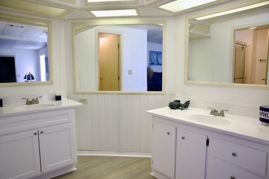 This lovely, 2/2 manufactured home on leased land in Lake on Pine Lakes Country Club in Florida - for sale on GolfHomes.com, golf home, golf lot