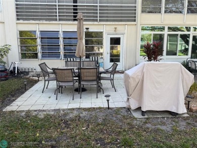 FANTASTIC REMODELED 2 BEDROOMS GROUND FLOOR, Stainless steel on Hillsboro Pines Golf in Florida - for sale on GolfHomes.com, golf home, golf lot