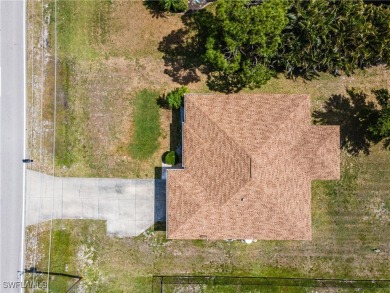 Beautiful 3-Bedroom + Den Home in Quiet NW Cape Coral - Next to on Burnt Store Golf Club in Florida - for sale on GolfHomes.com, golf home, golf lot