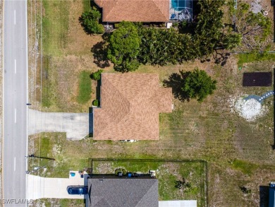 Beautiful 3-Bedroom + Den Home in Quiet NW Cape Coral - Next to on Burnt Store Golf Club in Florida - for sale on GolfHomes.com, golf home, golf lot
