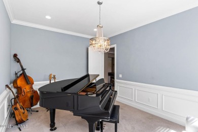 Welcome to 341 Bay Hill Court, an extraordinary custom-built on Rivers Edge Golf Club in North Carolina - for sale on GolfHomes.com, golf home, golf lot
