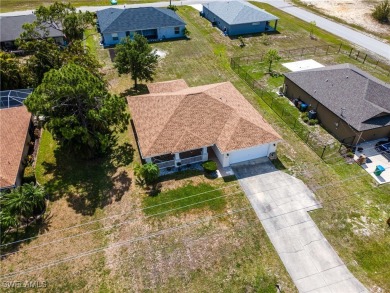 Beautiful 3-Bedroom + Den Home in Quiet NW Cape Coral - Next to on Burnt Store Golf Club in Florida - for sale on GolfHomes.com, golf home, golf lot