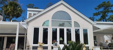 An elegant custom-built home in the sought after Sea Palms on Sea Palms Golf and Tennis Resort in Georgia - for sale on GolfHomes.com, golf home, golf lot