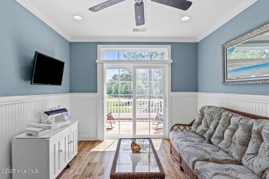 Welcome to 341 Bay Hill Court, an extraordinary custom-built on Rivers Edge Golf Club in North Carolina - for sale on GolfHomes.com, golf home, golf lot