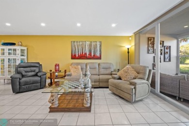 Palm Aire Country Club Golf Home! Remodeled with sophistication on Palm-Aire Country Club and Resort - The Oaks in Florida - for sale on GolfHomes.com, golf home, golf lot