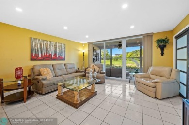 Palm Aire Country Club Golf Home! Remodeled with sophistication on Palm-Aire Country Club and Resort - The Oaks in Florida - for sale on GolfHomes.com, golf home, golf lot
