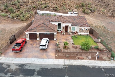 This executive home is on a great golf course location close to on Cerbat Cliffs Golf Course in Arizona - for sale on GolfHomes.com, golf home, golf lot
