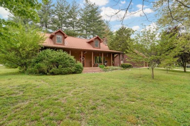 One-of-a-Kind Log Home - Walking Distance To Lake Taneycomo - on Thousand Hills Golf Resort in Missouri - for sale on GolfHomes.com, golf home, golf lot