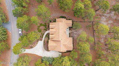 Come see this beautiful home with Membership in Pinewild Country on Pinewild Country Club of Pinehurst in North Carolina - for sale on GolfHomes.com, golf home, golf lot