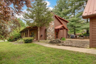One-of-a-Kind Log Home - Walking Distance To Lake Taneycomo - on Thousand Hills Golf Resort in Missouri - for sale on GolfHomes.com, golf home, golf lot