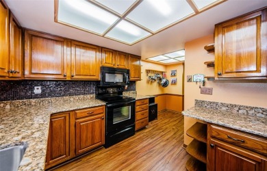 Under contract-accepting backup offers. NEW PRICE!! This warm on East Lake Woodlands Country Club in Florida - for sale on GolfHomes.com, golf home, golf lot