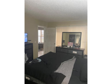 Calling All Investors!! This well-maintained 2-bedroom on Country Club At Silver Springs Shores in Florida - for sale on GolfHomes.com, golf home, golf lot